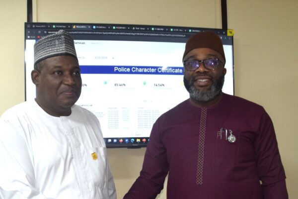 Dr. Sani Gwarxo Inspects the Monitoring Dashboard for Police Character Certificate