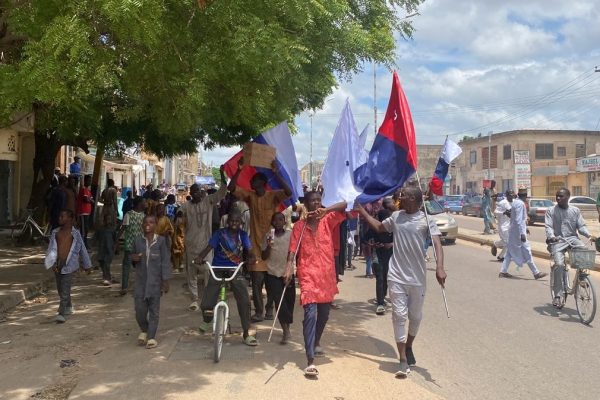 76 Russian-flag-flying suspects transferred to Abuja for #EndBadGovernance protest, face sedition charges.